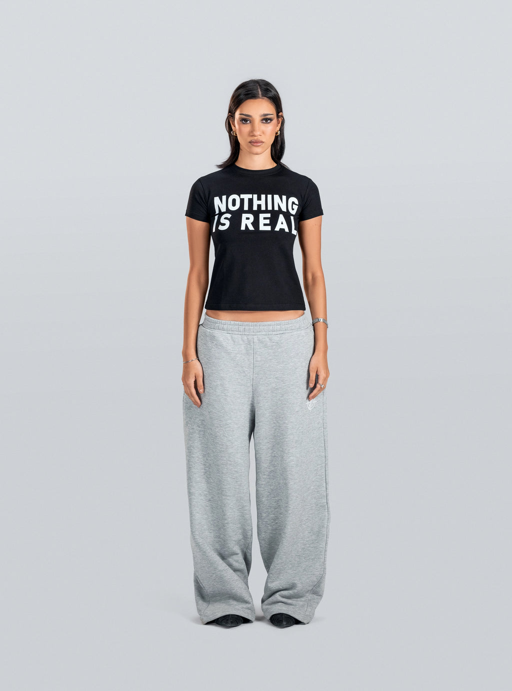 NOTHING IS REAL Baby Tee