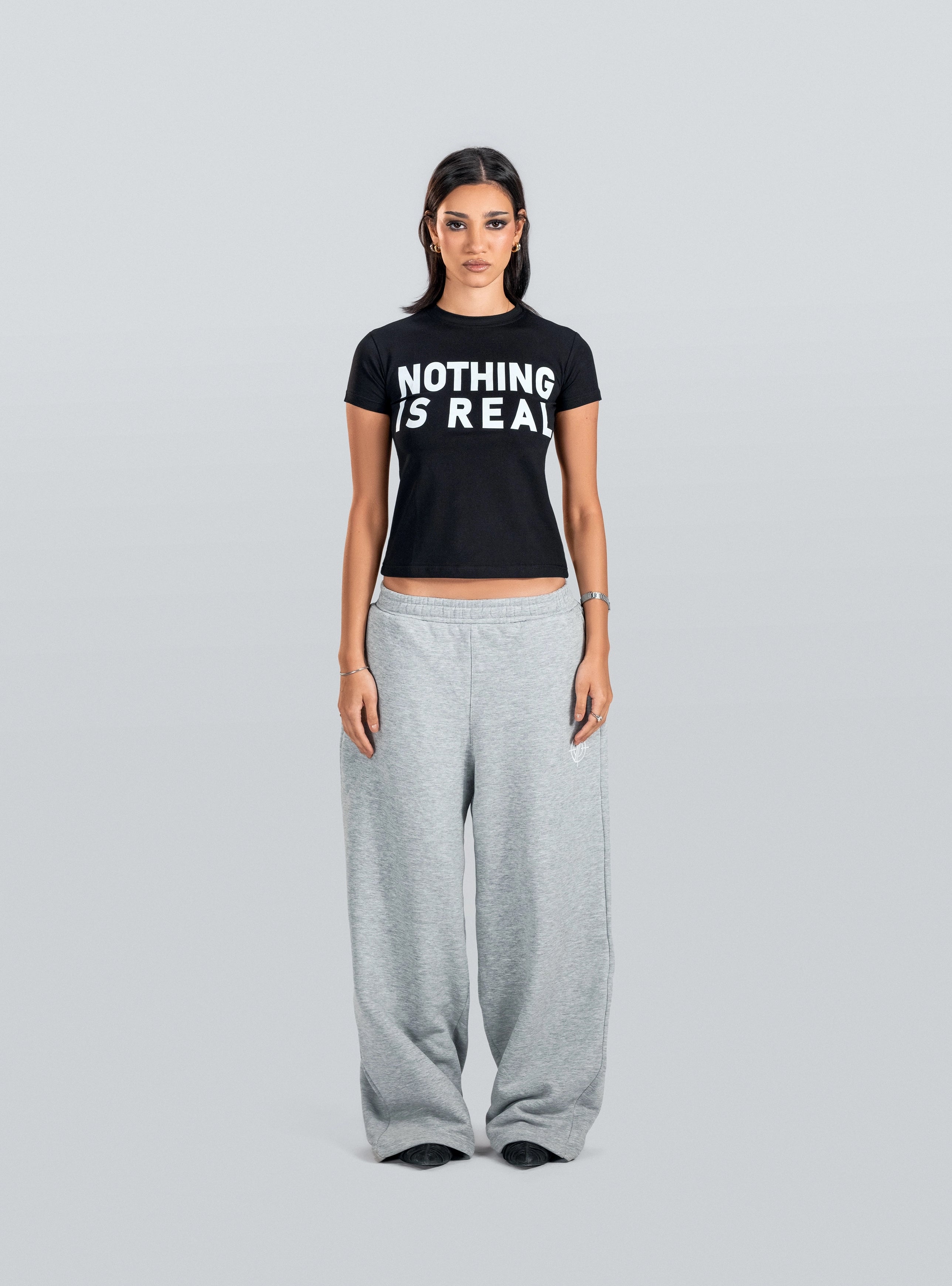 NOTHING IS REAL Baby Tee