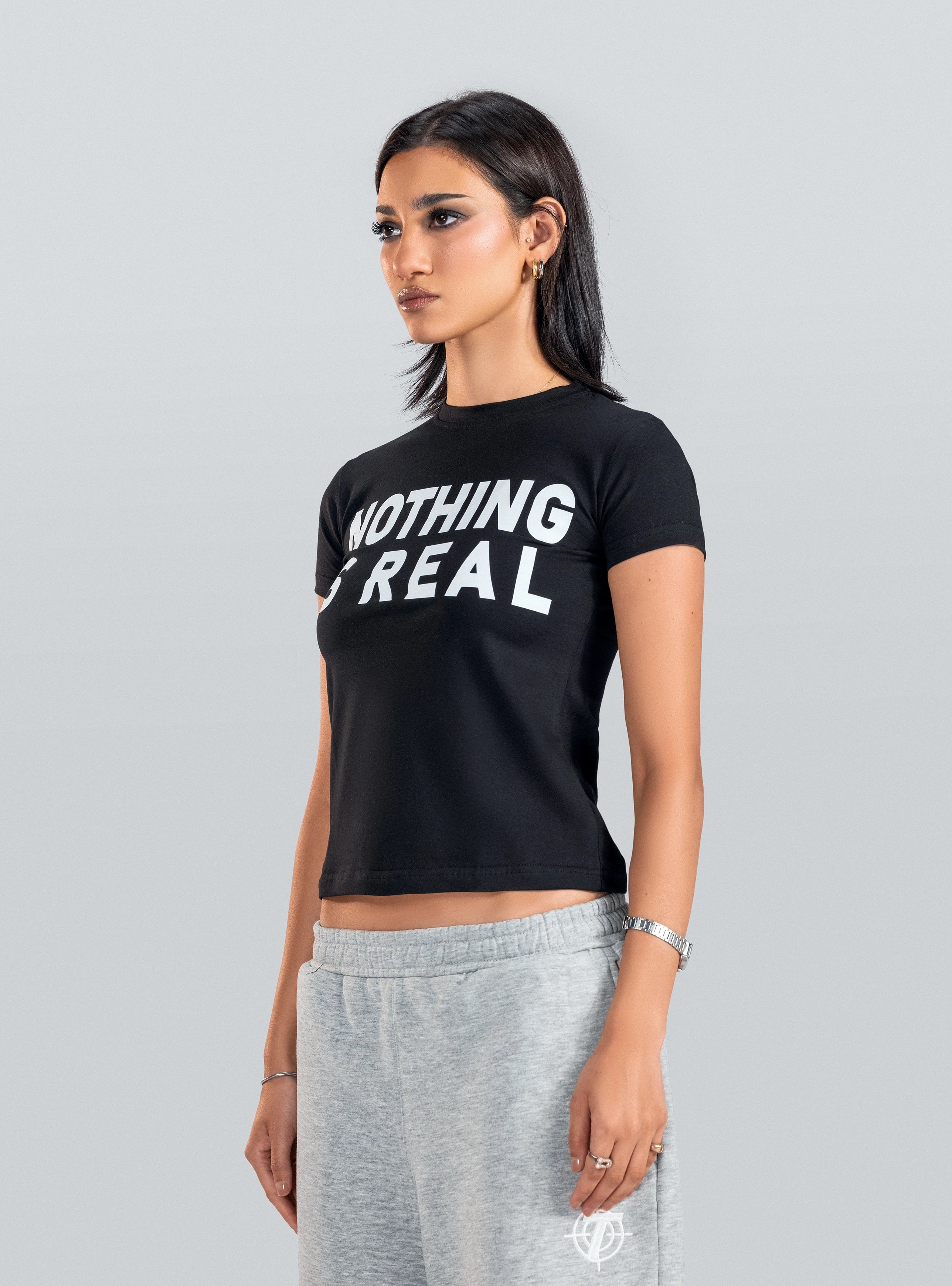NOTHING IS REAL Baby Tee