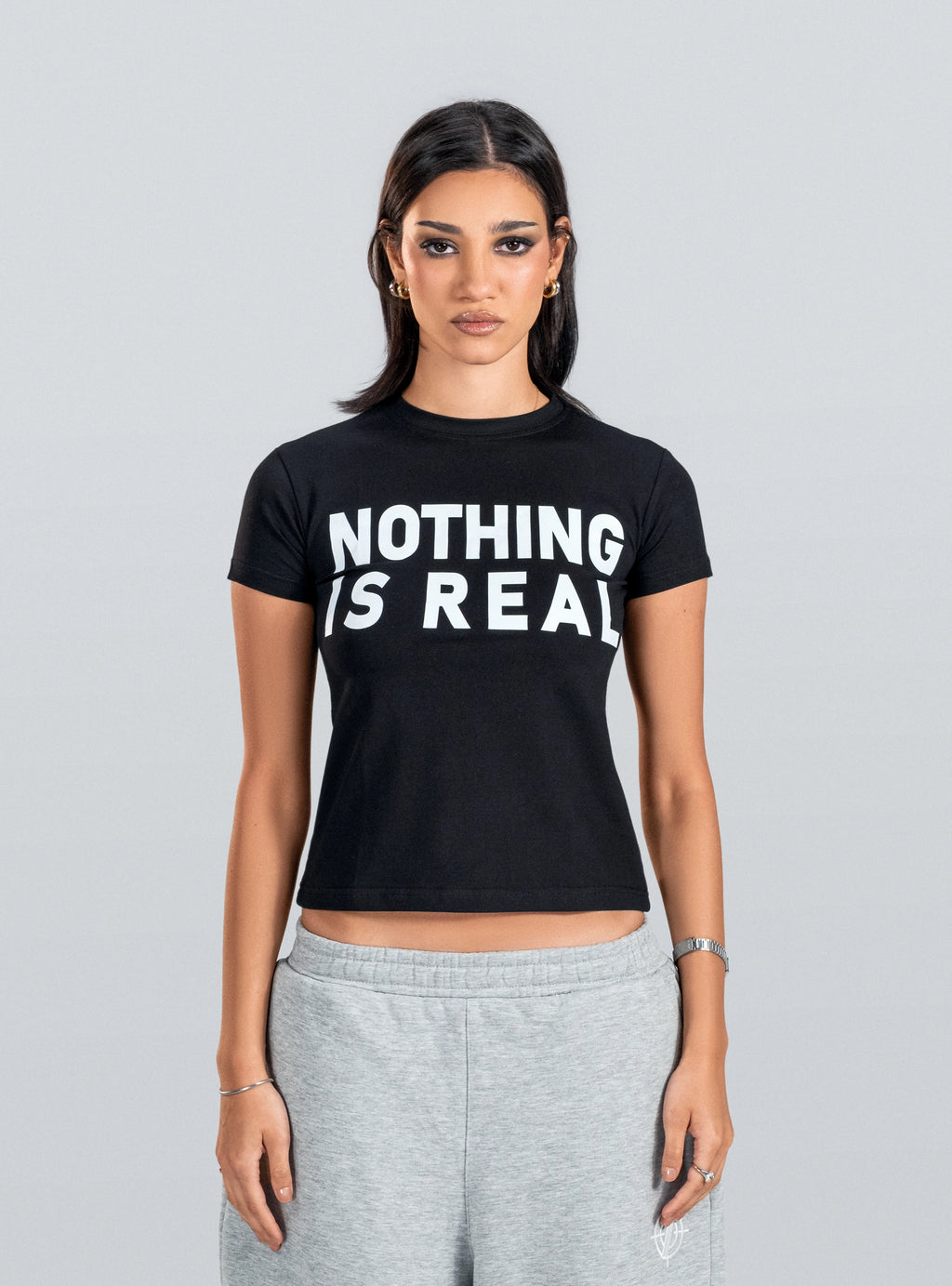 NOTHING IS REAL Baby Tee