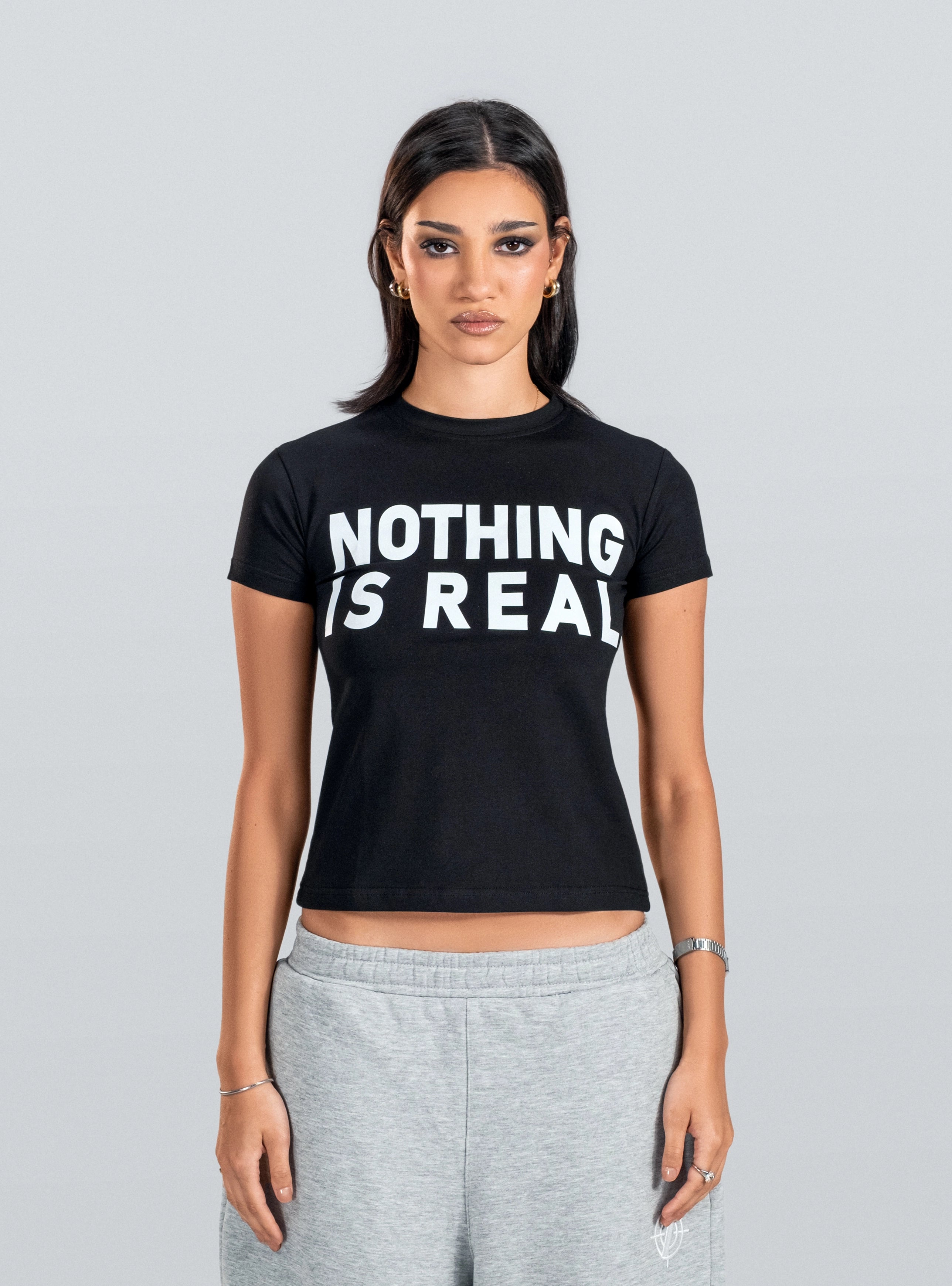 NOTHING IS REAL Baby Tee